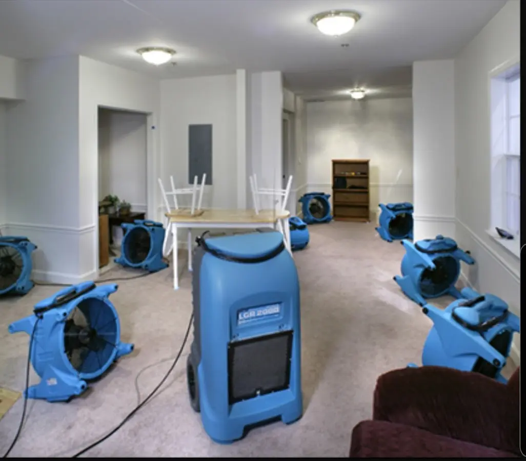 Air movers and dehumidifier setup for Water Damage Restoration in Ridley